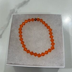 🍊✨ Embrace the Radiance of the Preciosa Orange Crystal Bracelet! ✨🍊
